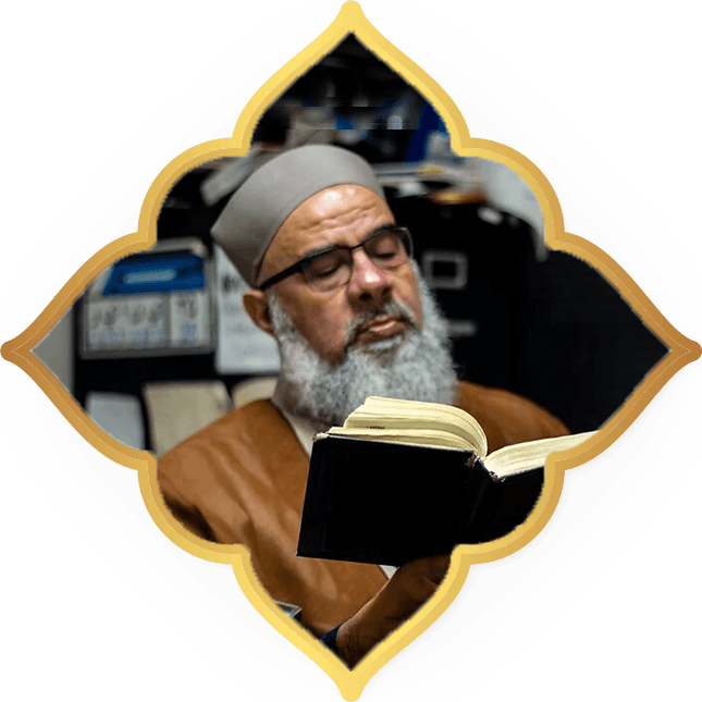 Sheikh Saad reading, inside a gold frame
